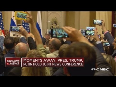 Reporter escorted out of Trump-Putin news conference