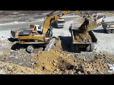 Caterpillar 390D Excavator Loading Fleet Of Mercedes & MAN Trucks And Dumpers - Pyramis Ate