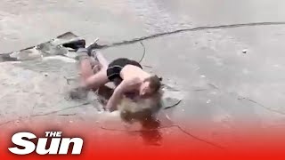 Half naked ice skater crashes through thin ice of frozen Amsterdam canal