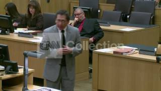 ARIAS TRIAL:MEDICAL EXAMINER-HEAD GUNSHOT WOUND