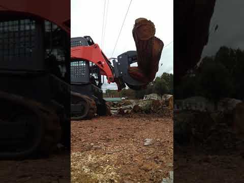 Kubota svl75 with new frost bite grapple!!!! Team BTS
