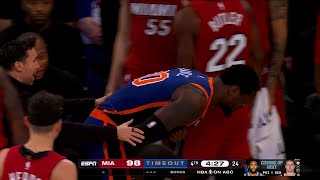 Julius Randle leaves the arena in pain after an unlucky landing on his shoulder