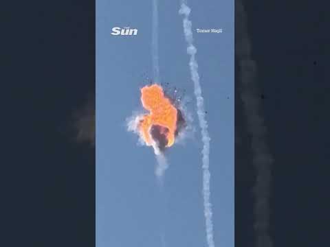 Dramatic moment Iranian drone is blown up over Israel leaving onlookers stunned