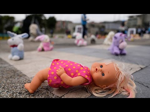 Colombians protest child sexual abuse with dolls in front of Attorney General's Office