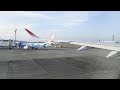 機窓 JL900便 那覇空港を離陸 海と第2滑走路 RR Trentエンジンを響かせて