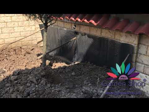 Come installare una membrana di drenaggio per un giardino roccioso