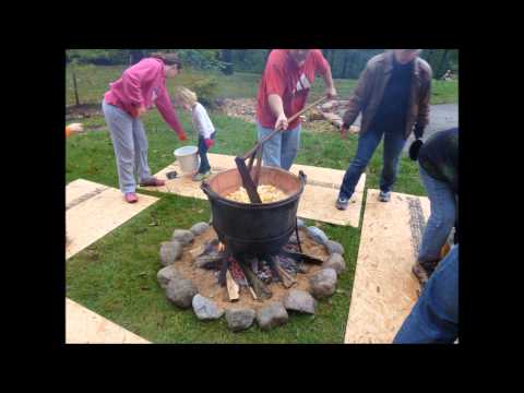 Making apple butter in copper kettle. 