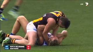 Australian Football player trying to choke opponent to death