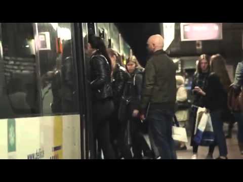 GUY LAUGHING LOUD ON TRAIN