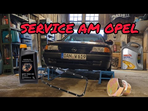Opel Astra F | Replacing the oil pan gasket and changing the transmission and engine oil