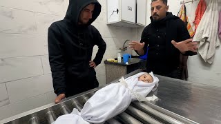 تشييع الطفل علي أبو زور (3 أشهر) الذي توفي بسبب البرد القارس في مخيمات النازحين بغزة