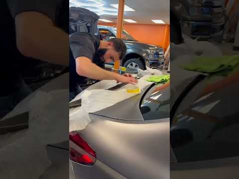 Installing carbon fiber spoiler on a BMW M5!