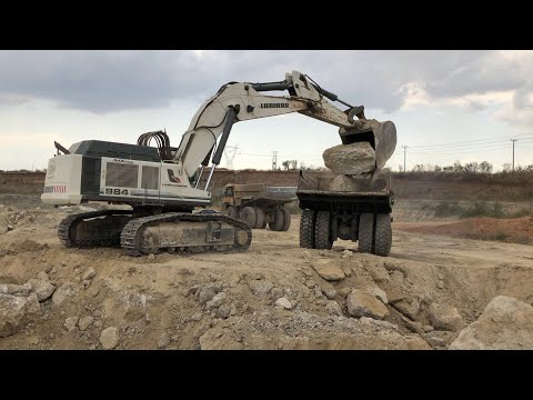 Liebherr 984 Excavator Loading Caterpillar 775E And Terex Dumpers - Kivos Ate