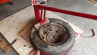How to get a Harbor Freight style manual tire changer to break a rusty wheel tire bead
