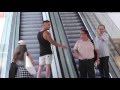 Touching Strangers Hands On The Escalator