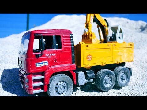 Vidéo en français pour enfants  de véhicules de construction: jeux de sable