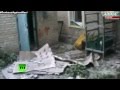Последствия обстрела села Красногоровка под Донецком 