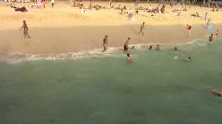People Jumping off Pier at Local Hawaii Beach (No Sound)