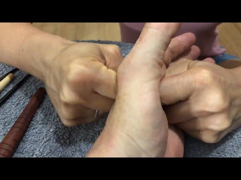 Deep hand massage and reflexology using tools part 3 Brandon getting his hand massaged.