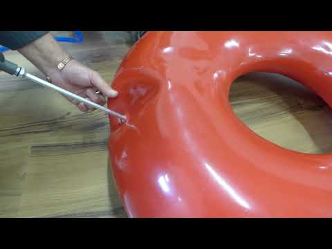 Inflation of a rotomolded tube with a long nozzle device