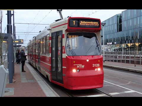HTM GTL-8 tram 3128 vertrekt van station Delft