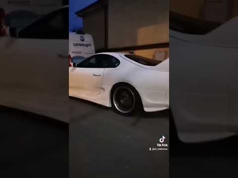 Toyota Supra MK4 doing nasty burnout in the street !