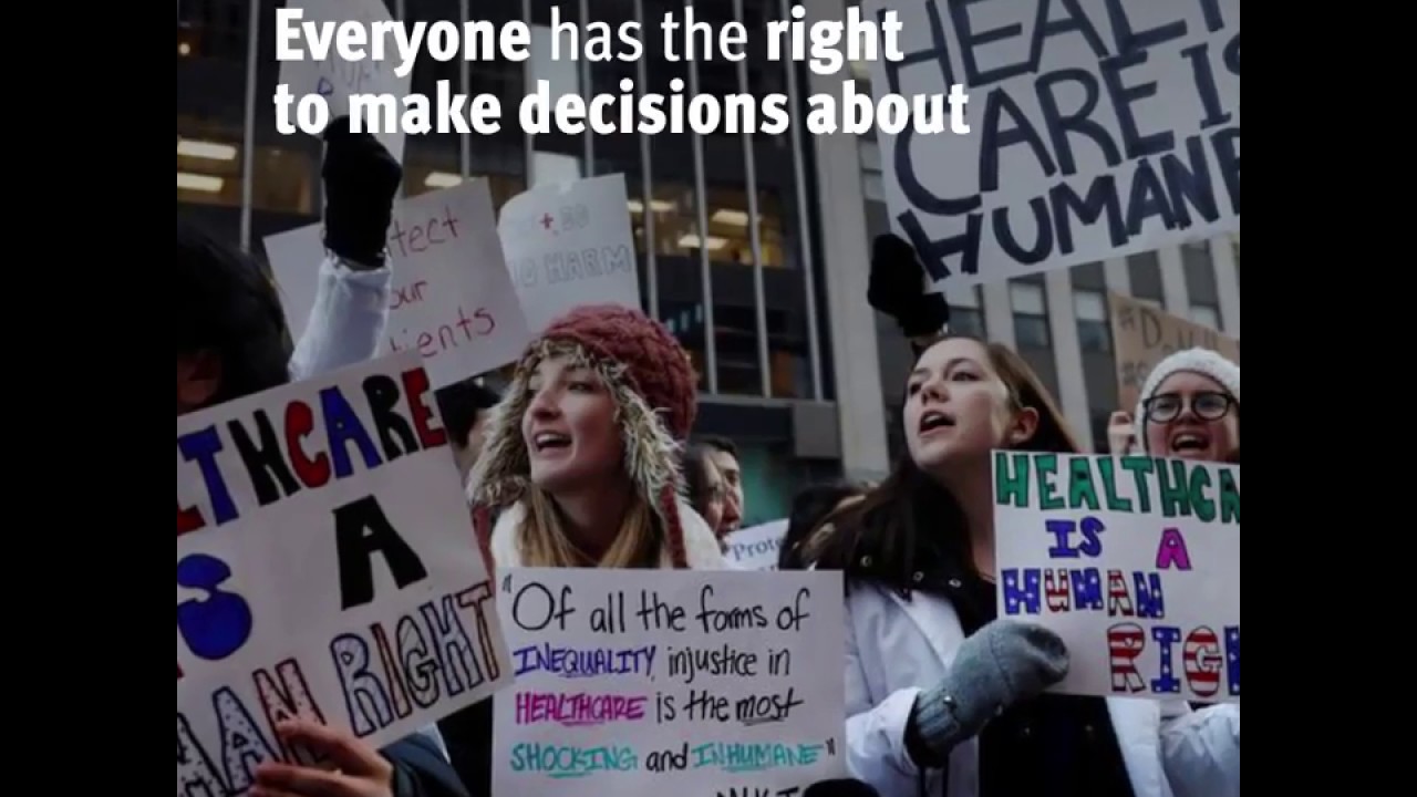 Supporters of contraception rally before Zubik v. Burwell, an appeal brought by Christian groups demanding full exemption from the requirement to provide insurance covering contraception under the Affordable Care Act, is heard by the U.S. Supreme Court in