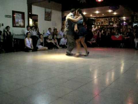  Fabian Peralta  and  Virginia Pandolfi  are  dancing  to  the  tango  "  Sinsabor  "