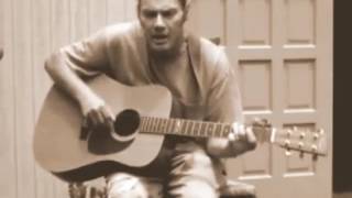 MALCOLM  HOLCOMBE  Dressed  in White