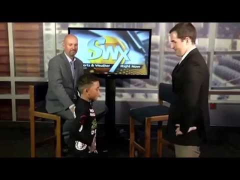 Kids world champion does flying arm bar on news anchor, during live interview .