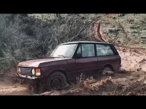 Range Rover Classic 2500 VM and Defender TD5 dealing with some mud in Spain.