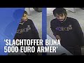Verdachte babbeltruc op camera in luxe kledingwinkel