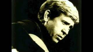 Buck Owens-It Don&#39;t Show On Me