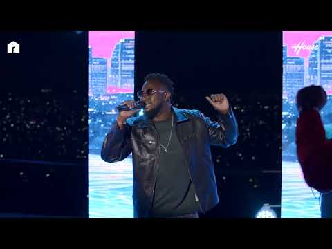 Levixone performing More Blessings ￼at House of Love ministries 