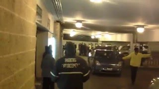 Protesters Storm Parking Gragae At Trump Rally