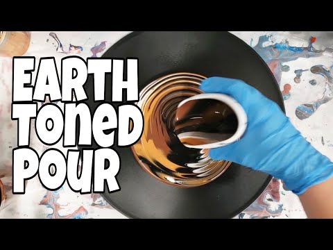 Earth toned acrylic pour on a vinyl record