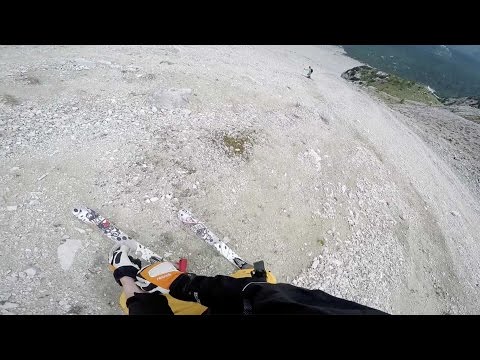 Skiing Down Rocky Mountains In The Dolomites