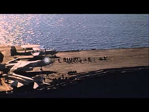 United States aircraft E-2A Hawkeye and KA-3B Skywarrior take off from USS Kitty ...HD Stock Footage