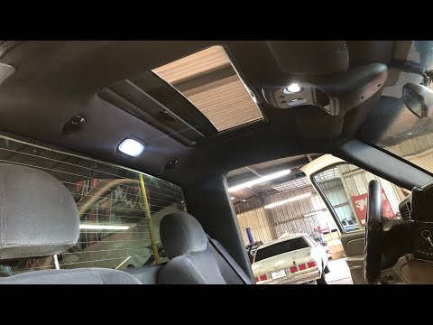 INSTALLING A SUNROOF ON MY 2004 GMC SINGLE CAB AND BLACKING OUT MY INTERIOR