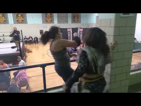 Honey Badger attempts a pin of Laura Loveless in the bleachers! RIGHT IN FRONT OF ME!!