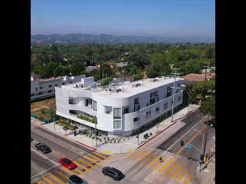 Magnolia Hill Apartments by Brooks Scarpa Architects