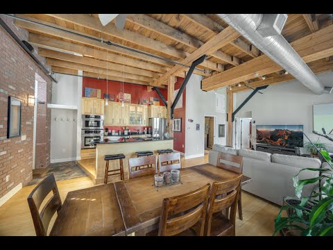 Rare 2 bed corner penthouse upgraded loft with two parking spaces!