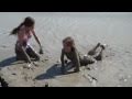 Girls playing in mud