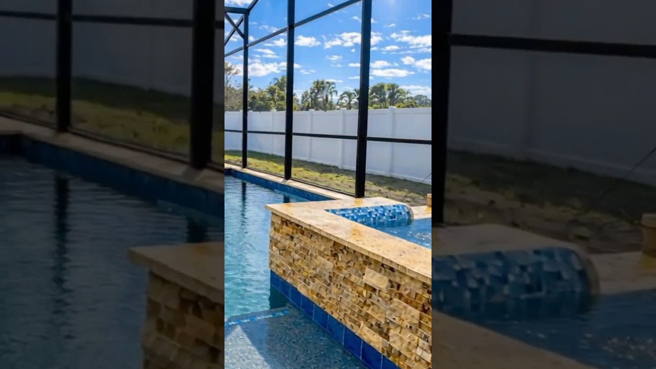 Palm Coast Custom Pool with Raised Spa and Sun Shelf Construction #palmcoast #poolconstruction