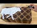 Carving A Bull From Patterned Block