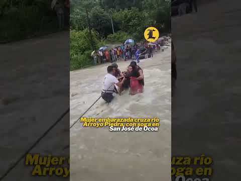 Mujer embarazada cruza río Arroyo Piedra con soga en San José de Ocoa