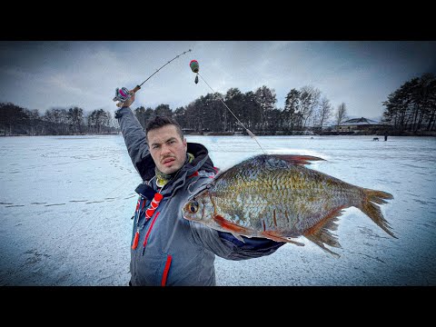 Mission Ice Pike! Fish pulls rod into ice hole 🤯