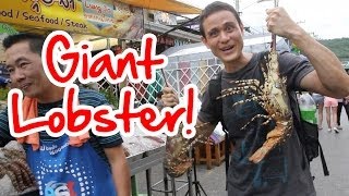 preview picture of video 'Monster 1.1 kg Lobster in Hua Hin, Thailand at Lung Ja Seafood Restaurant (ร้านลุงจ่า)'