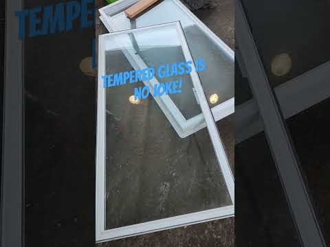 I took an old sliding glass door to the dump. Tempered glass is very strong, I couldn't break this!