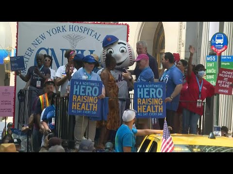 New York honors essential workers with 'Hometown Heroes' parade | AFP